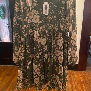 Beautiful green and pink dress. Very boho.